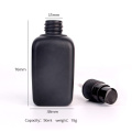 square 50ml glass bottle black colored with pump cap